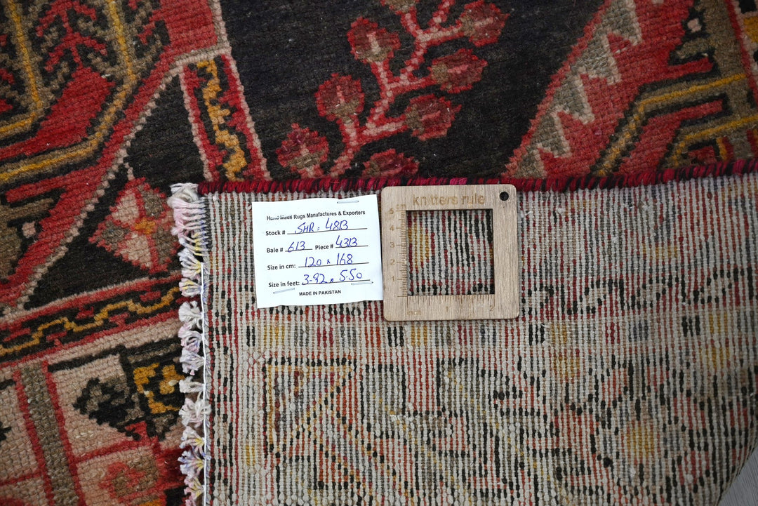 red Accent rug 3' 11" x 5' 6"