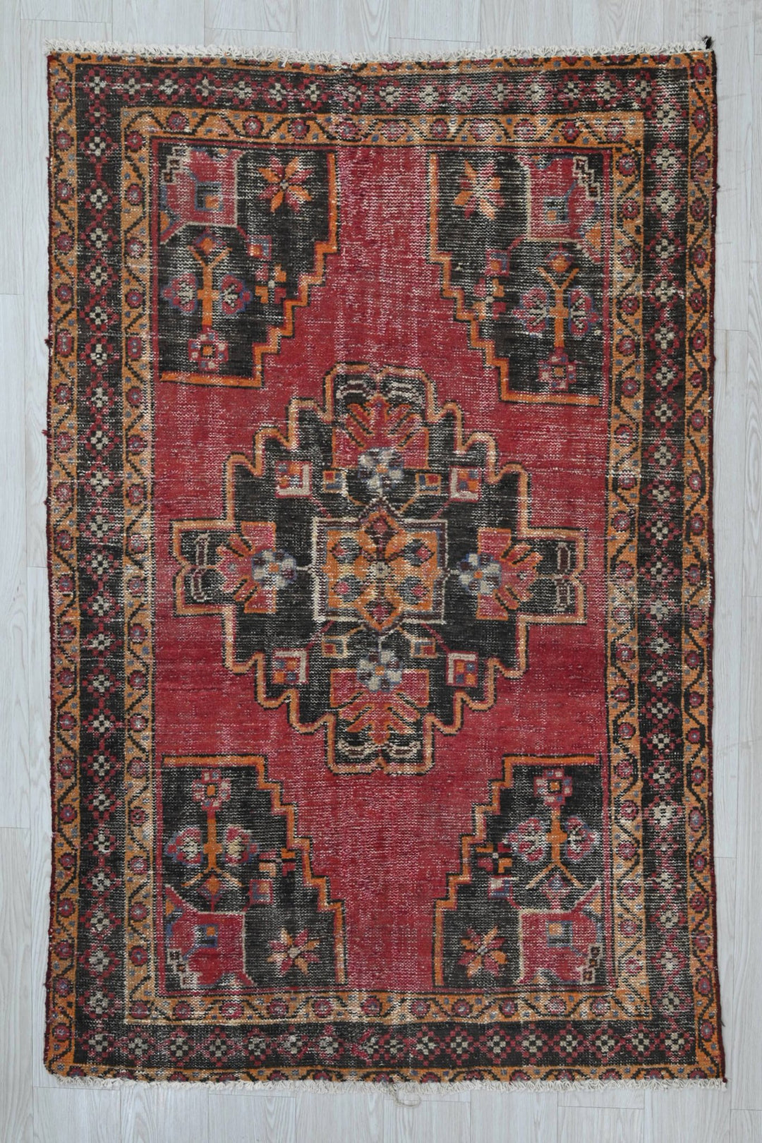 red Accent rug 3' 8" x 5' 9"