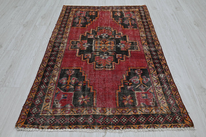 red Accent rug 3' 8" x 5' 9"