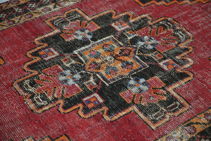 red Accent rug 3' 8" x 5' 9"