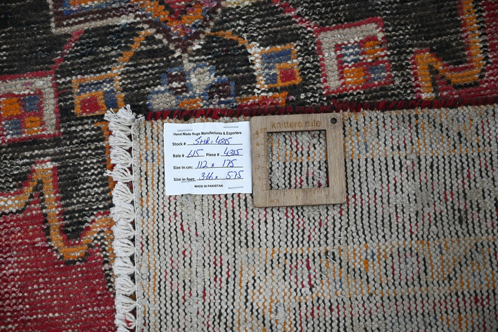 red Accent rug 3' 8" x 5' 9"