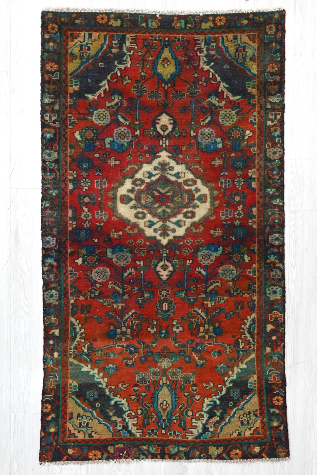 red Accent rug 3' 0" x 5' 10"