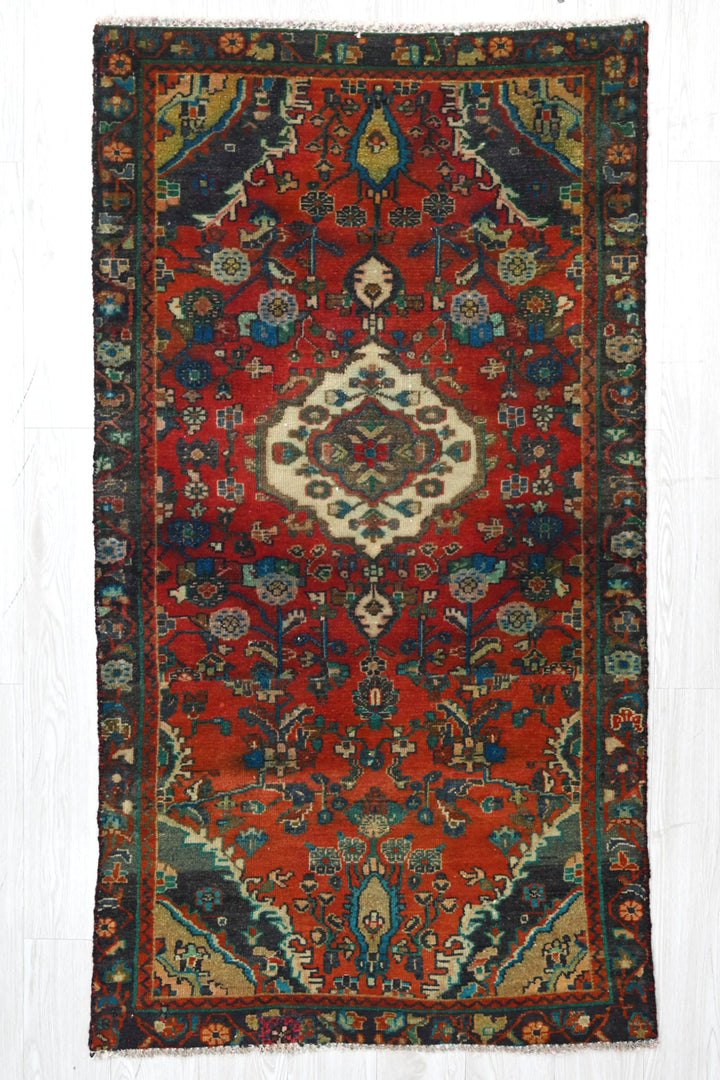 red Accent rug 3' 0" x 5' 10"