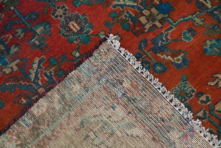 red Accent rug 3' 0" x 5' 10"