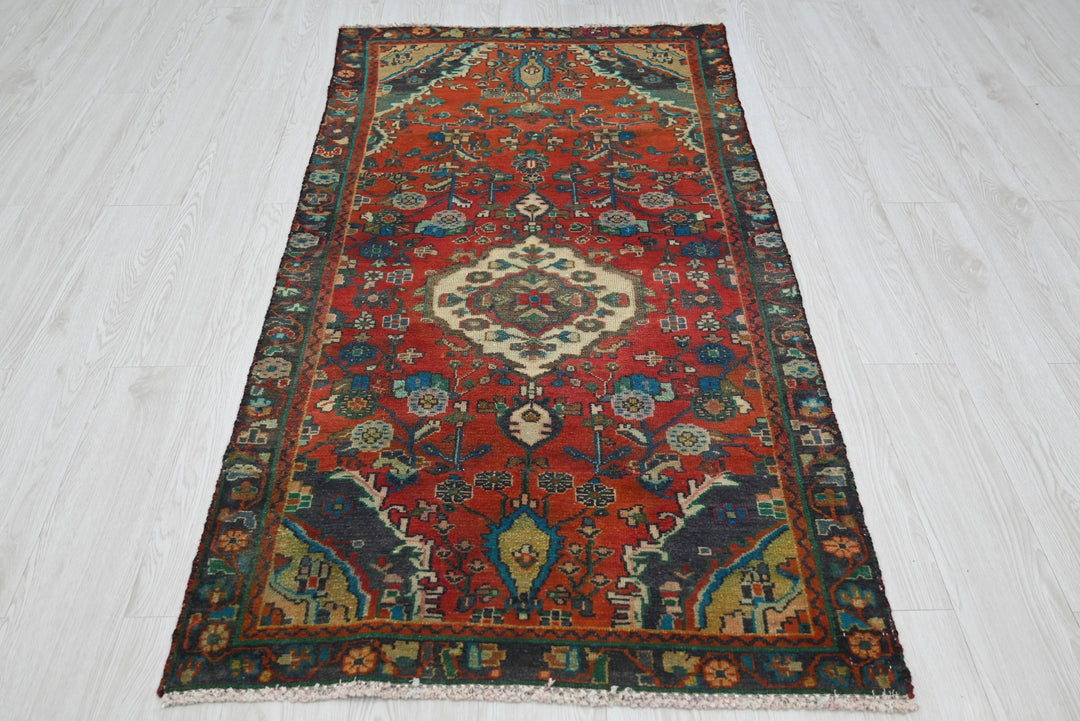 red Accent rug 3' 0" x 5' 10"