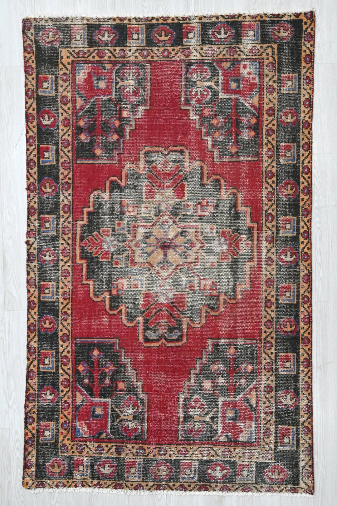 red Accent rug 3' 8" x 5' 11"