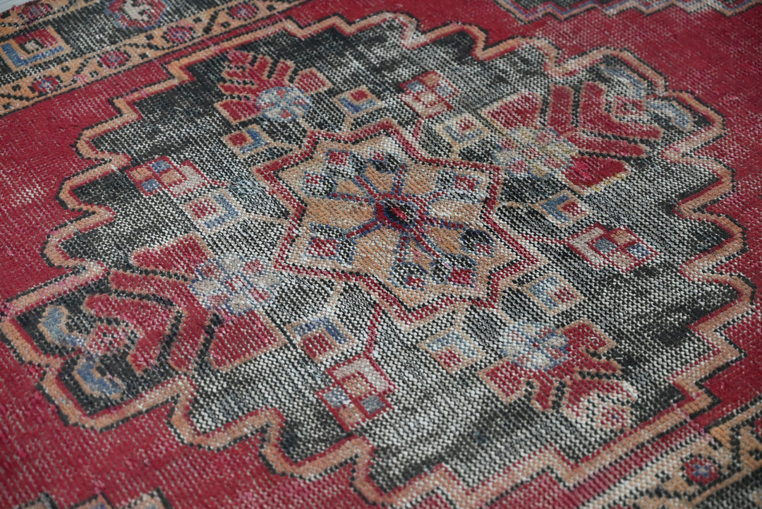 red Accent rug 3' 8" x 5' 11"