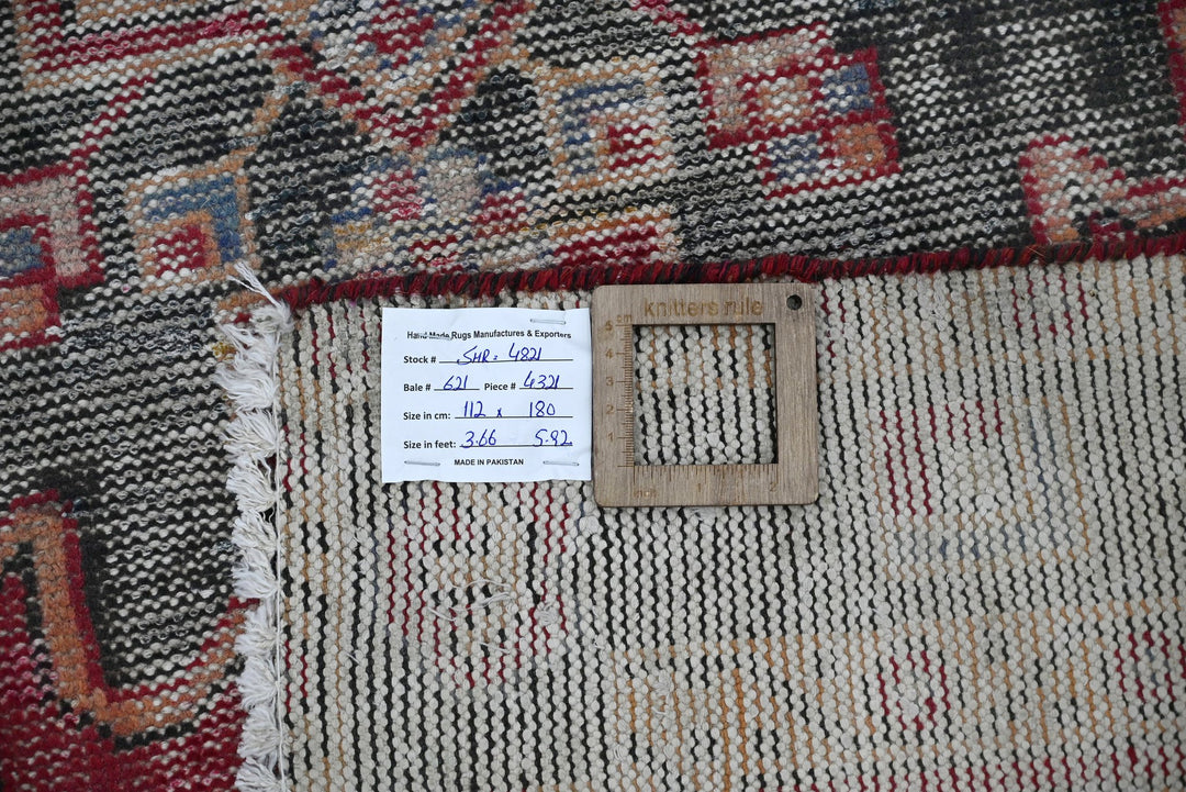 red Accent rug 3' 8" x 5' 11"