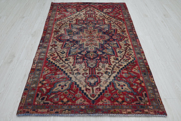 red Accent rug 3' 11" x 6' 6"