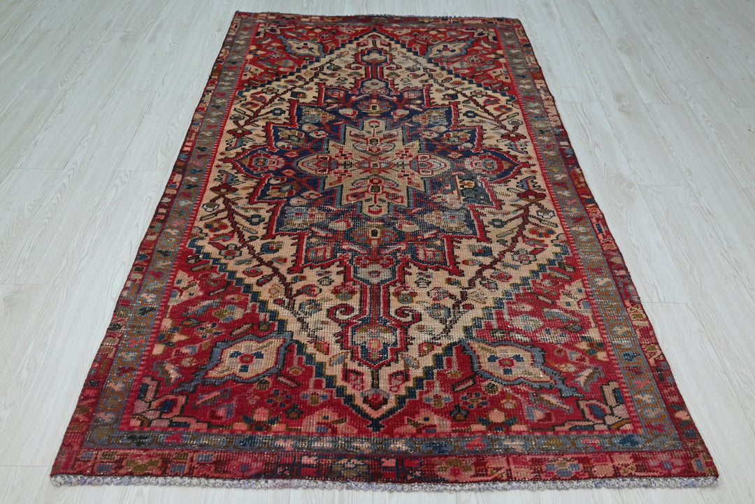 red Accent rug 3' 11" x 6' 6"