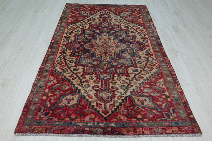 red Accent rug 3' 11" x 6' 6"