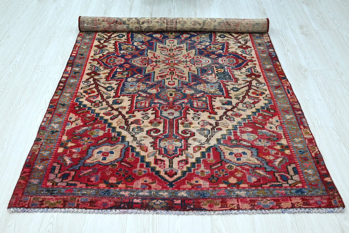 red Accent rug 3' 11" x 6' 6"