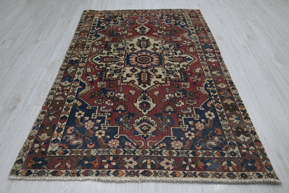 red Medium rug 4' 7" x 7' 2"