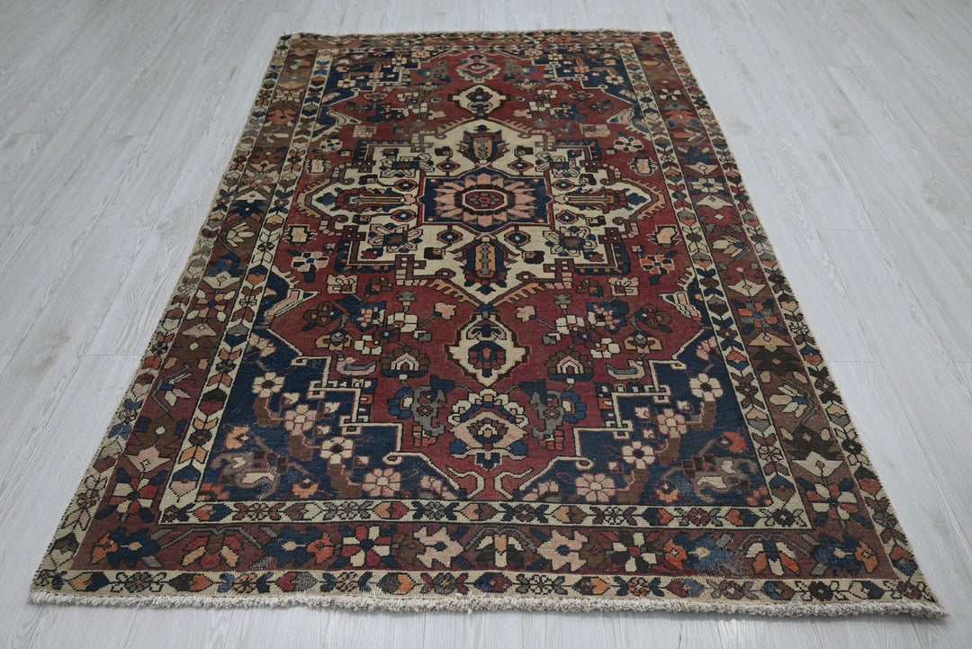 red Medium rug 4' 7" x 7' 2"