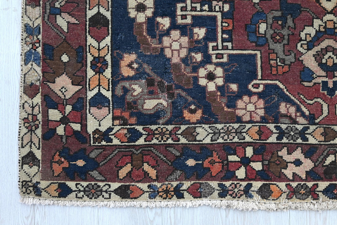 red Medium rug 4' 7" x 7' 2"