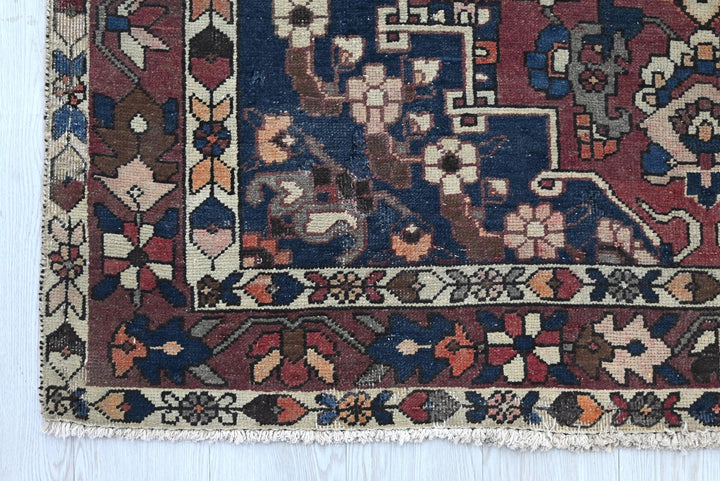 red Medium rug 4' 7" x 7' 2"