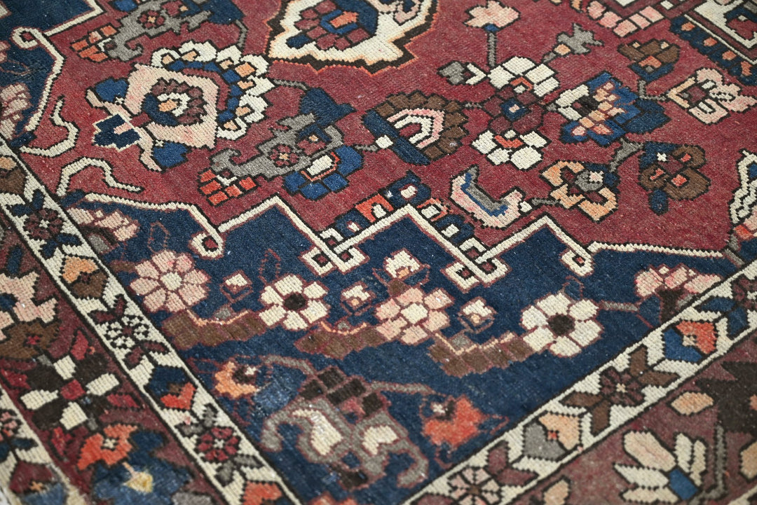 red Medium rug 4' 7" x 7' 2"