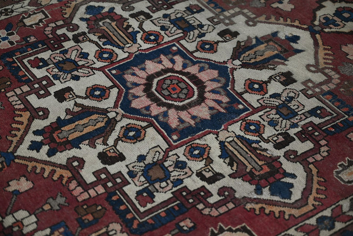 red Medium rug 4' 7" x 7' 2"
