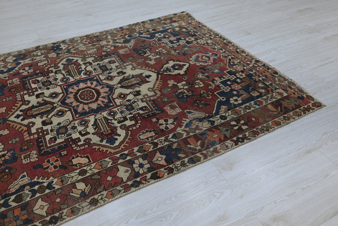 red Medium rug 4' 7" x 7' 2"