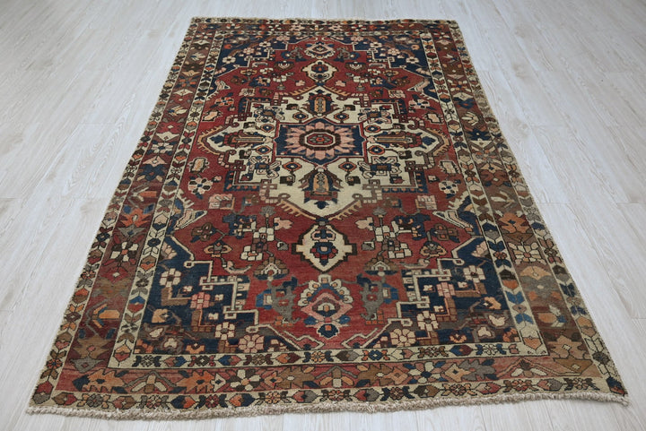 red Medium rug 4' 7" x 7' 2"