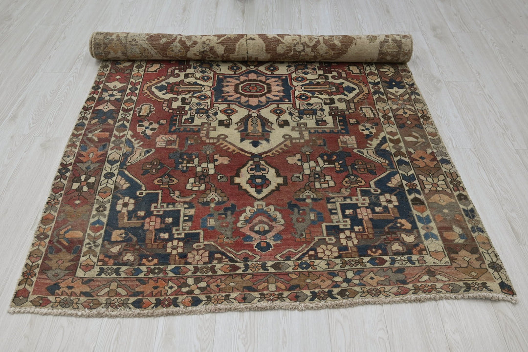 red Medium rug 4' 7" x 7' 2"