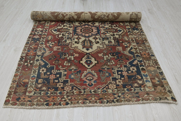 red Medium rug 4' 7" x 7' 2"