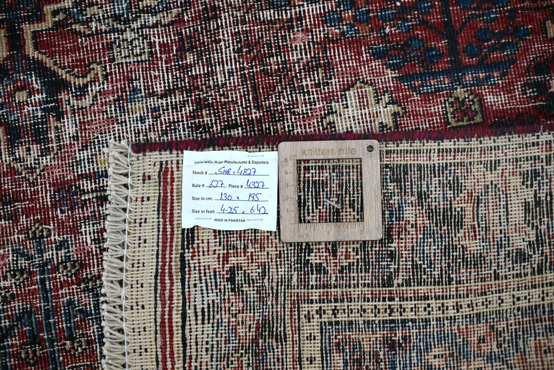 red Accent rug 4' 3" x 6' 5"