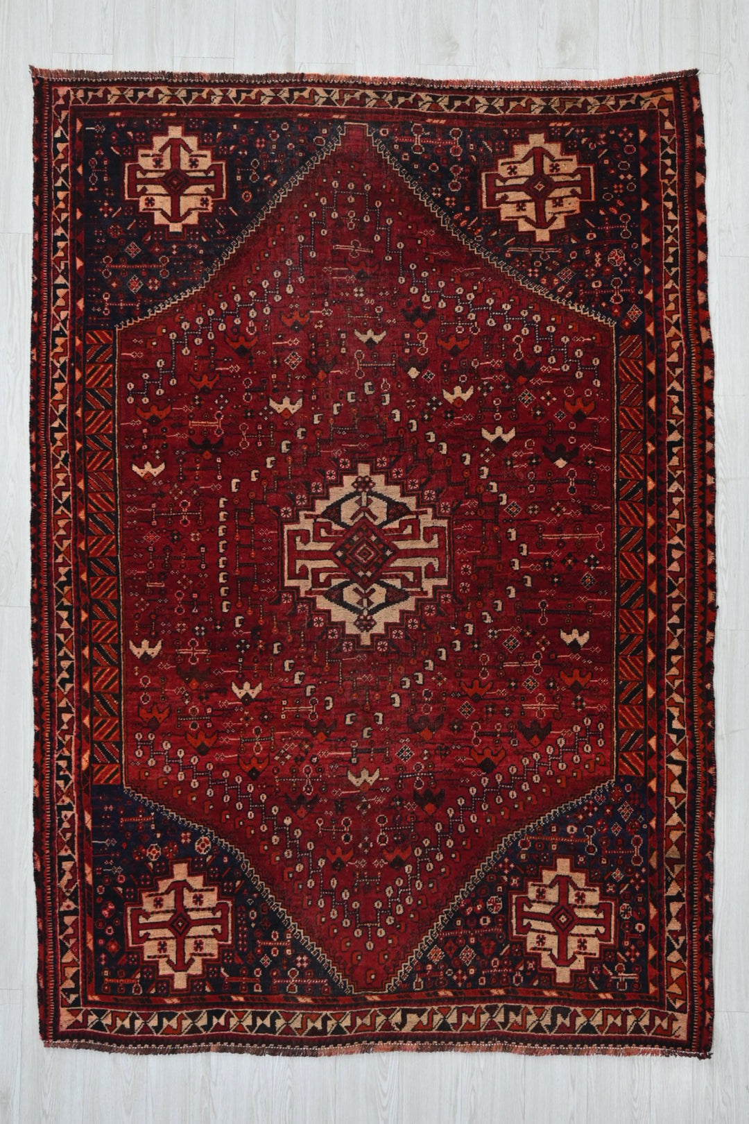 red Medium rug 5' 6" x 7' 8"