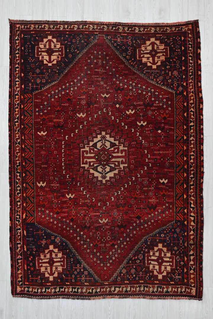 red Medium rug 5' 6" x 7' 8"