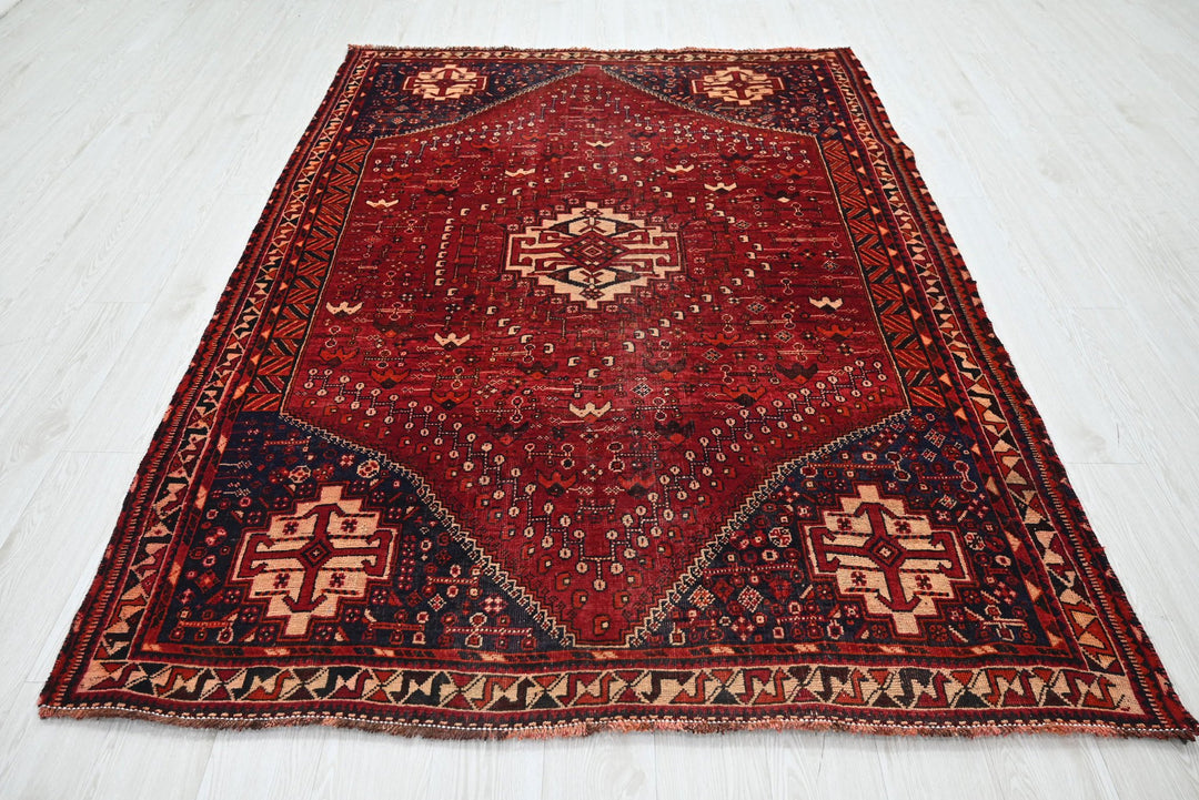 red Medium rug 5' 6" x 7' 8"