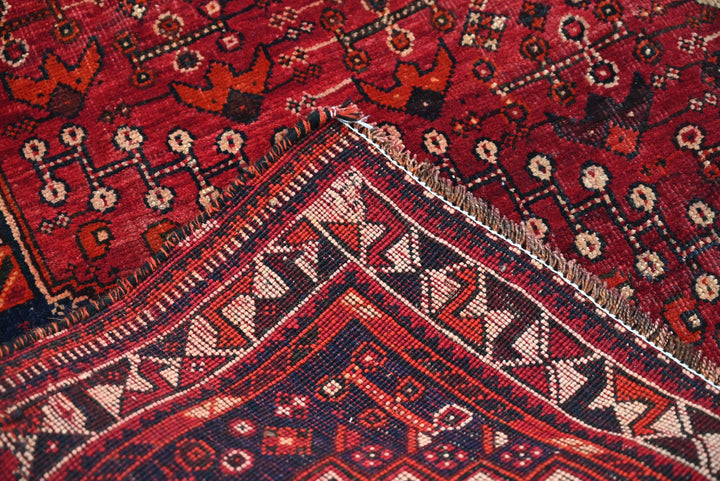 red Medium rug 5' 6" x 7' 8"
