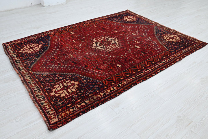 red Medium rug 5' 6" x 7' 8"