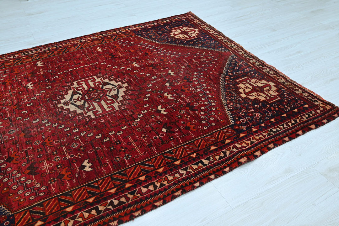 red Medium rug 5' 6" x 7' 8"