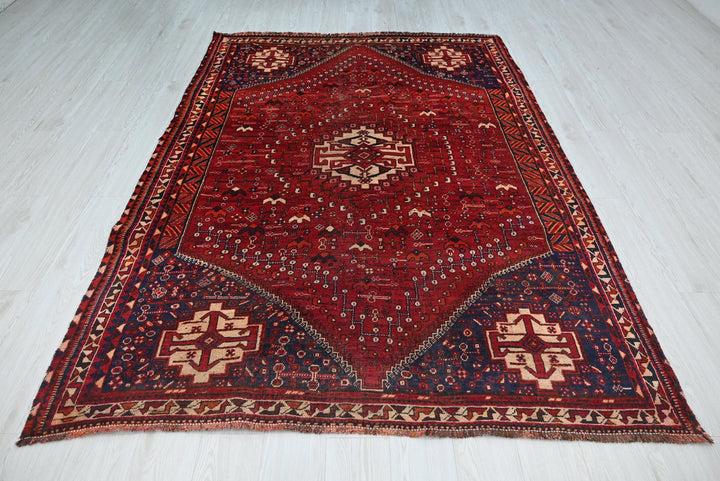 red Medium rug 5' 6" x 7' 8"