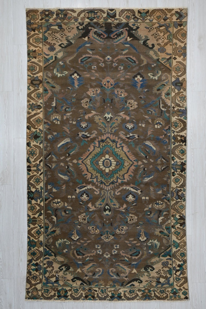 brown Medium rug 4' 11" x 9' 2"