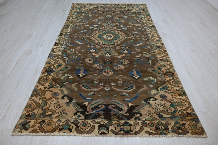 brown Medium rug 4' 11" x 9' 2"