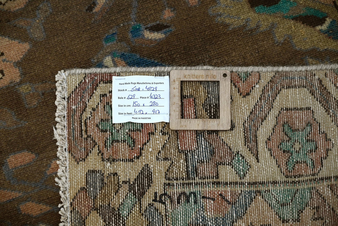 brown Medium rug 4' 11" x 9' 2"