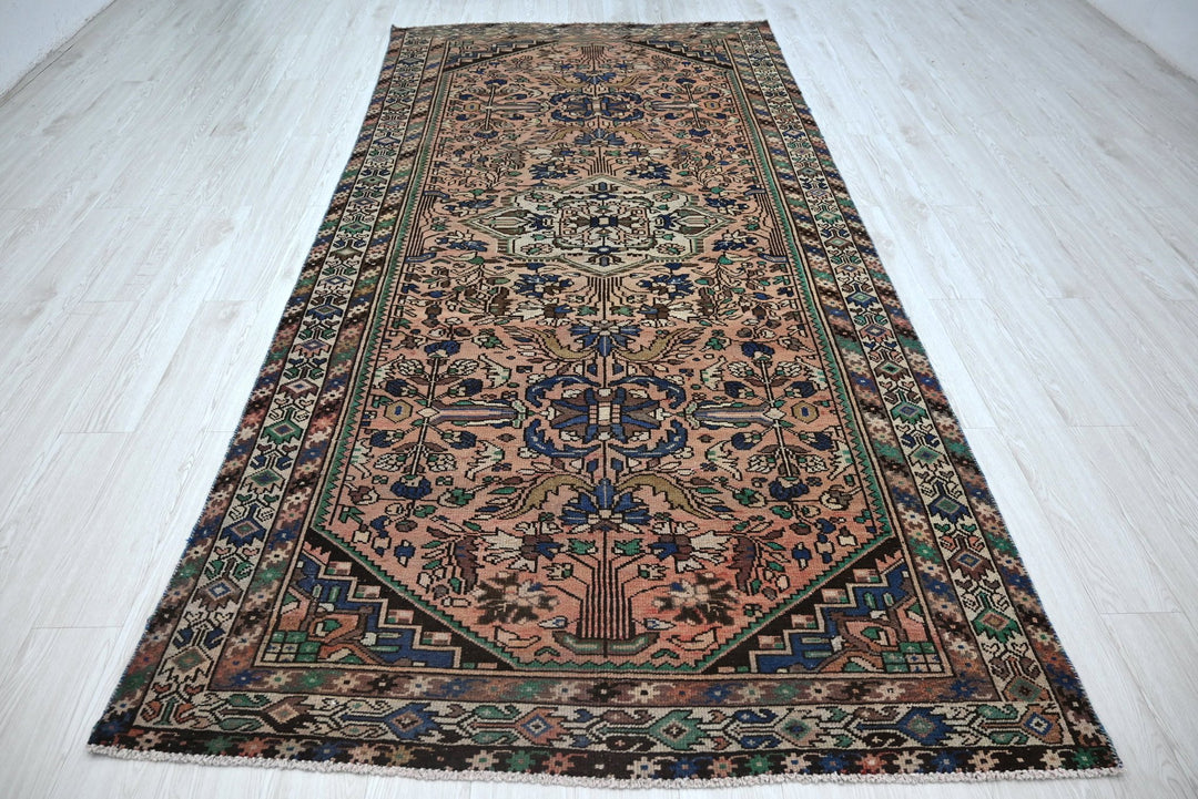 pink Large rug 5' 0" x 10' 2"