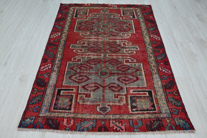 red Accent rug 3' 7" x 5' 5"