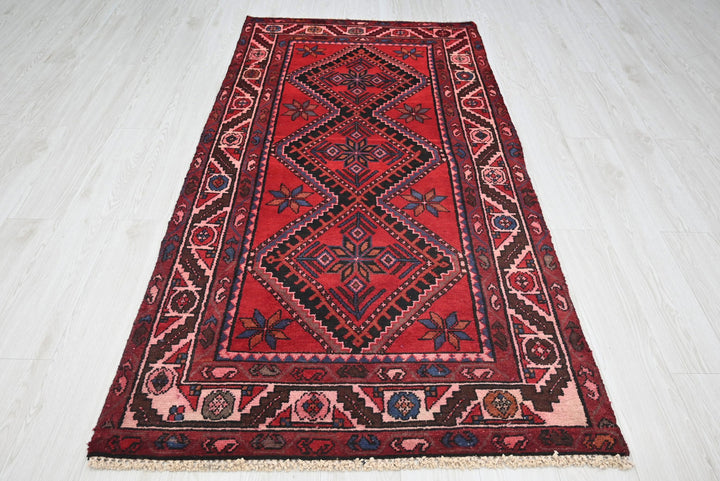 red Medium rug 3' 5" x 6' 7"