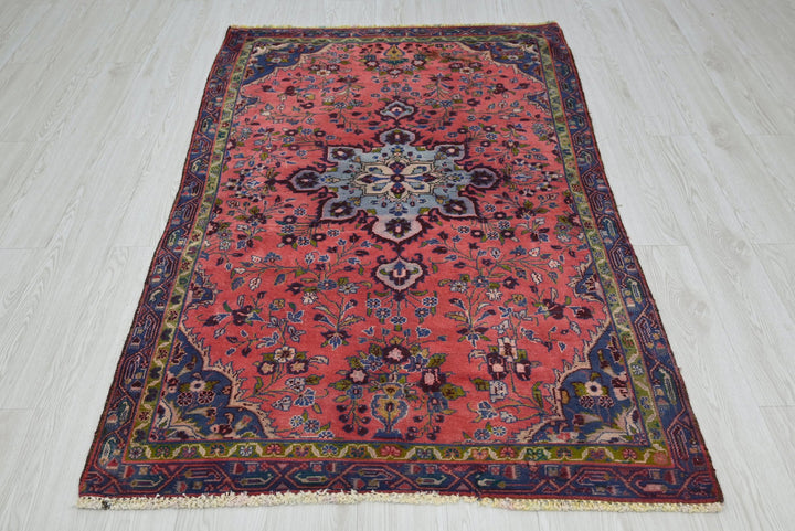 red Accent rug 3' 7" x 5' 9"