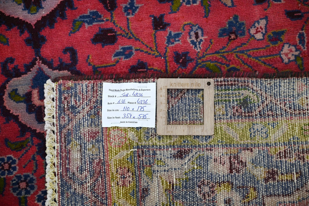 red Accent rug 3' 7" x 5' 9"