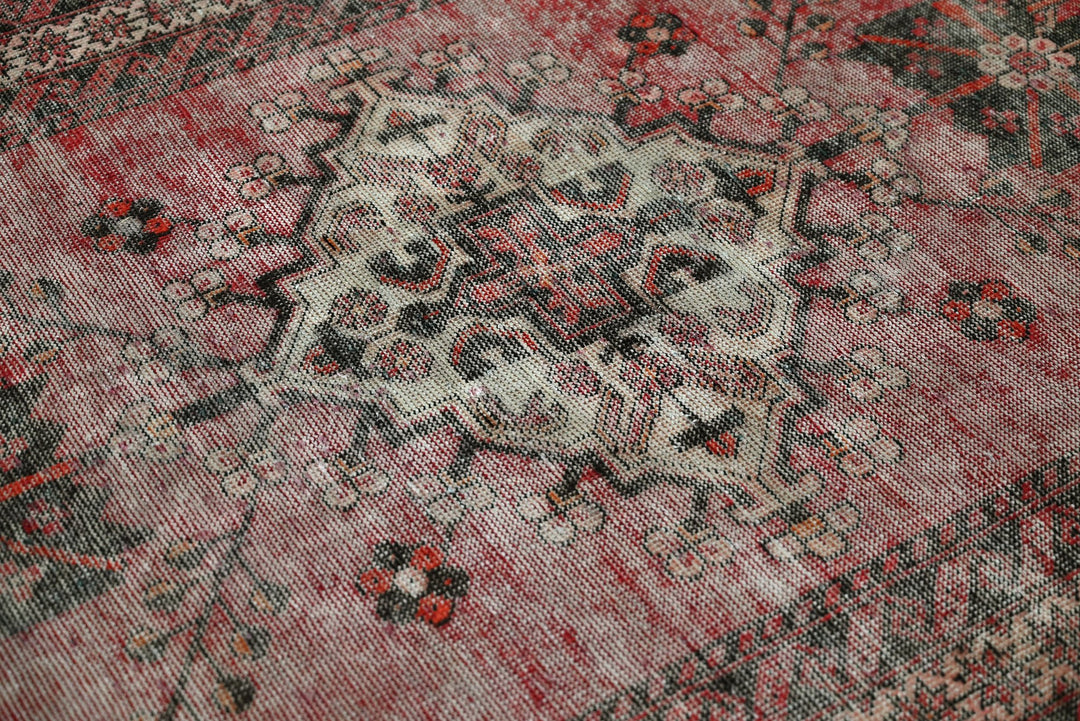 red Accent rug 3' 10" x 6' 4"