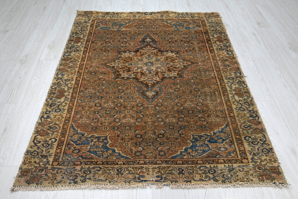 brown Accent rug 4' 1" x 5' 10"