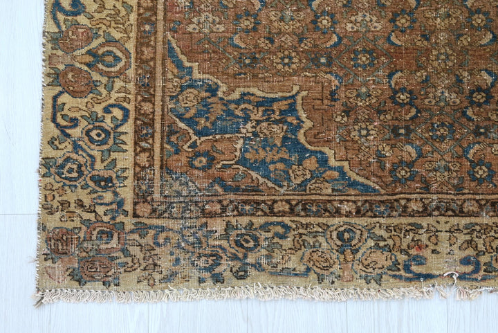 brown Accent rug 4' 1" x 5' 10"