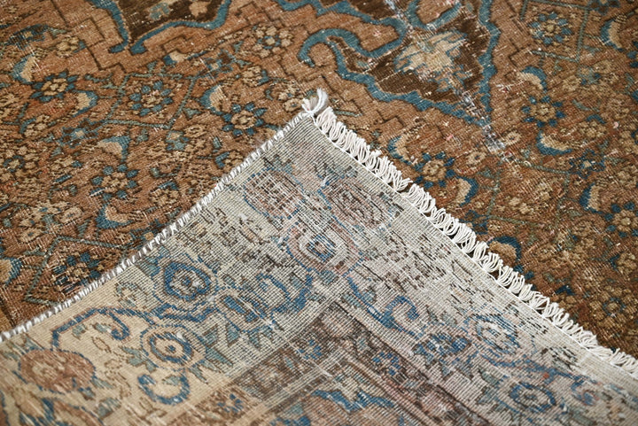 brown Accent rug 4' 1" x 5' 10"