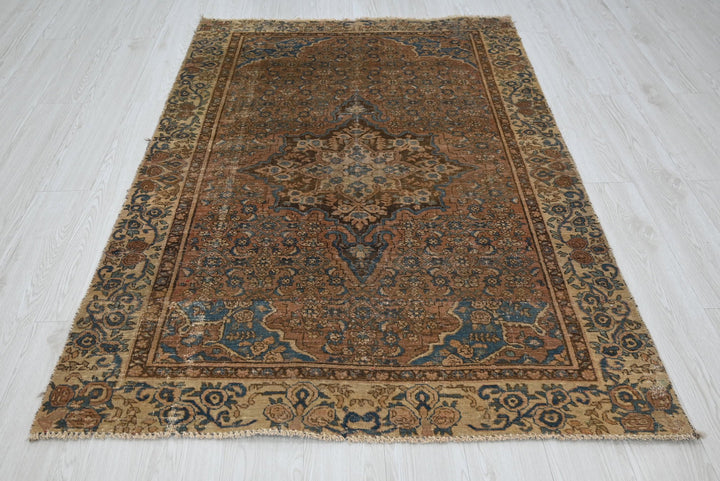 brown Accent rug 4' 1" x 5' 10"
