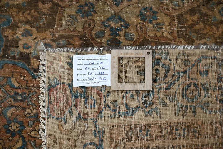 brown Accent rug 4' 1" x 5' 10"