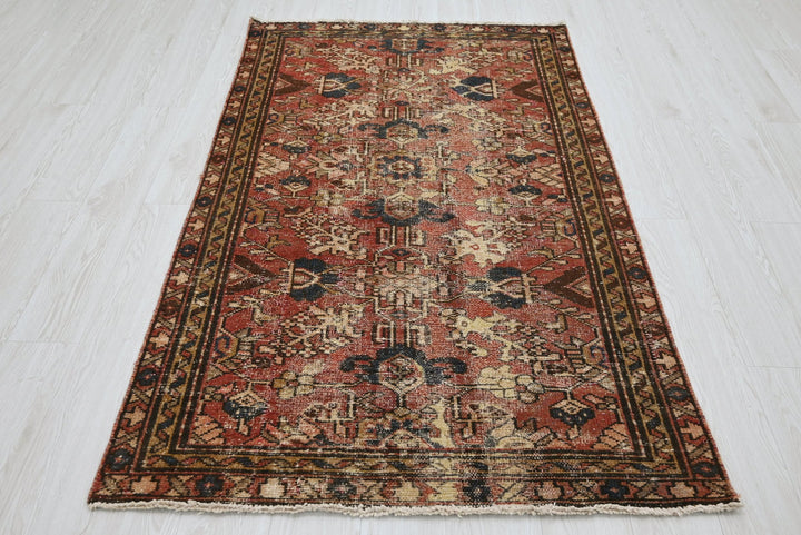 red Accent rug 3' 7" x 6' 0"