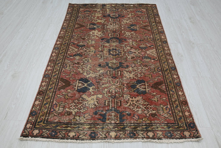red Accent rug 3' 7" x 6' 0"